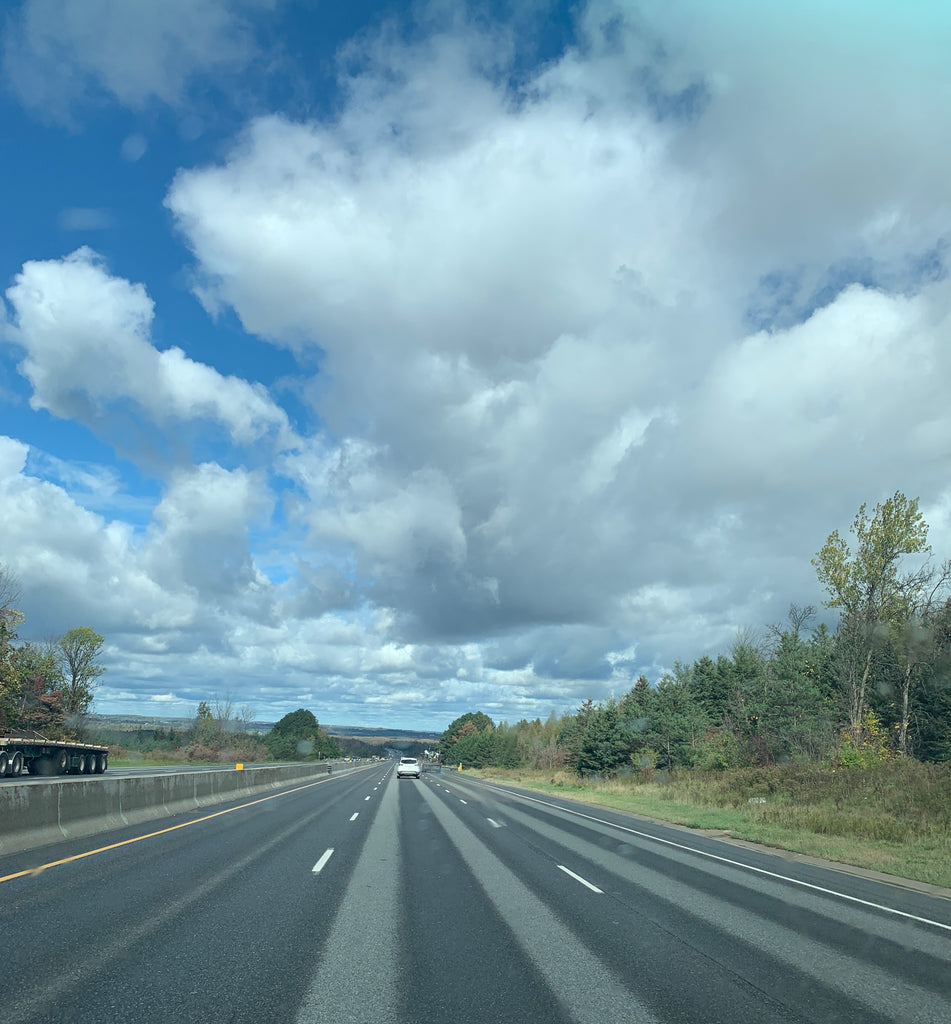 Open road with beautiful cloud formation